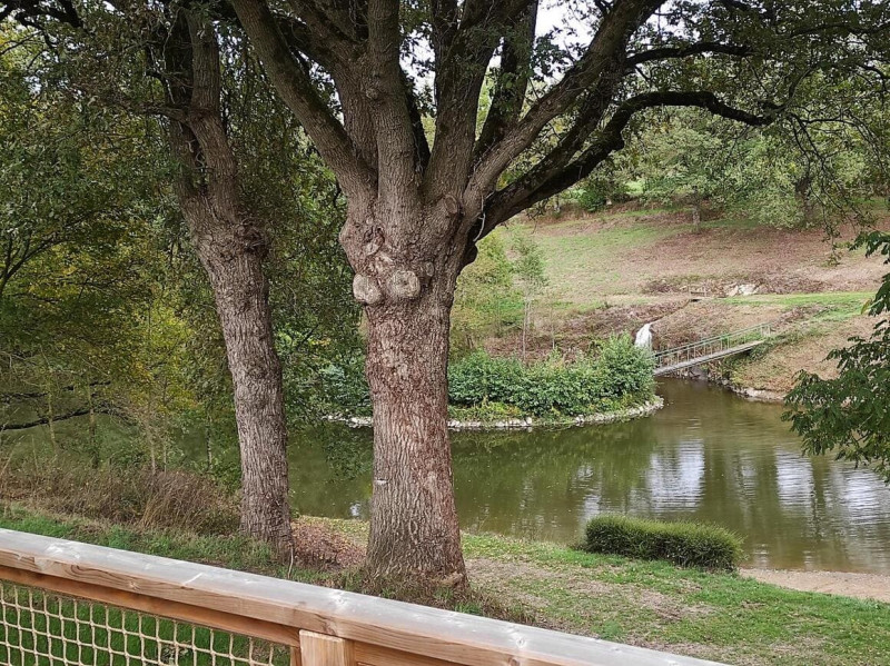 Chalet 5 personnes Les Logis de l'Oumois - © BEAUDOIN Chalet Nature Bois Ecolodge Camping