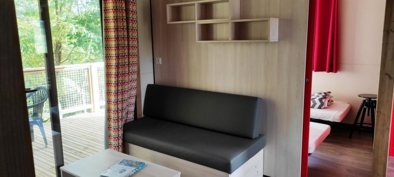 Chalet 7 personnes Les Logis de l'Oumois - © BEAUDOIN Chalet Insolite Bois Nature Ecolodge Camping Chambre